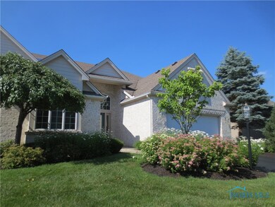 Lush and well-maintained landscaping/lawn.