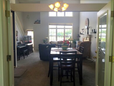 View from Sunroom into Dining/Livingroom