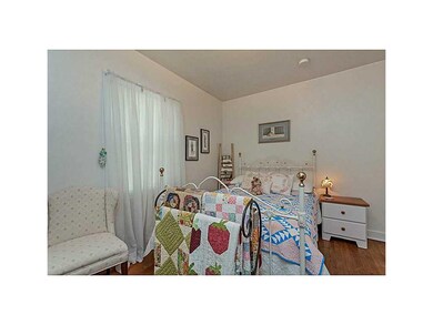 .Bedroom with Hardwood Flooring