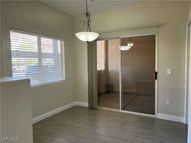 Unfurnished dining area with wood finished floors