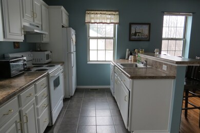 Kitchen has plenty of cabinets