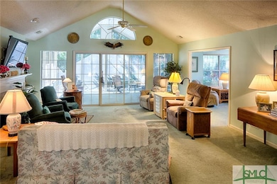 Large great room with vaulted ceilings, fireplace,