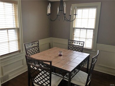 Breakfast area open to the kitchen is detailed wit