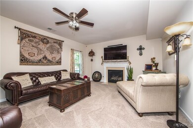 The family room is spacious and features a firepla