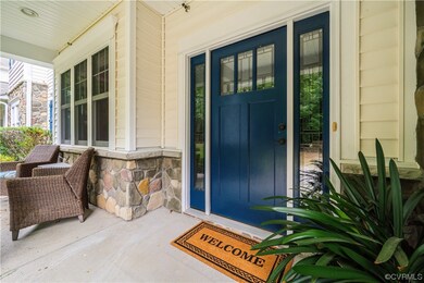 View of exterior entry featuring a porch