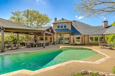 Exceptional outdoor living space and pool will fill your summers with fun!