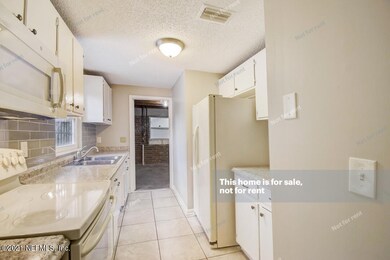 4749 Ricker Rd, Jacksonville, FL 32210 - photo 4