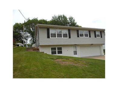 Front Exterior. Enter either from lower level fron