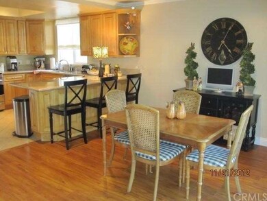 INFORMAL DINING AREA RIGHT OFF OF THE KITCHEN