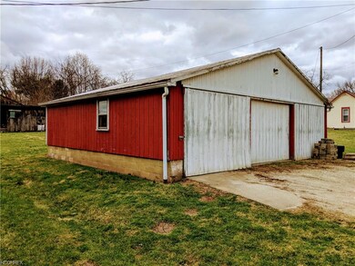 Street view of left side of garage (Home is left o