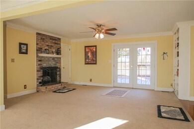 Although this home was built 1975, this home has been renovated and has open spaces and Living Room is open to the Kitchen and Dining area.