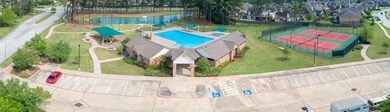 Neighborhood swimming pool, tennis courts, playground, pond and walktrails are just some of the benefits of living here.