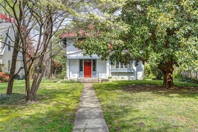 Mature grand magnolia offers a perfect spot for a swing to enjoy this deep lot.