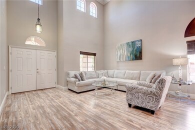 Soothing Grey Tones Flow Throughout the Entryway