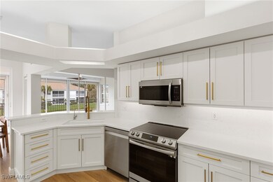 Kitchen featuring sink, light wood-type flooring,