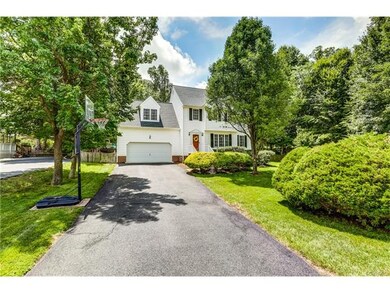 Low maintenance exterior with white vinyl siding a