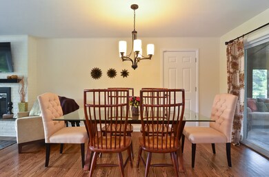 Dining room opens to both kitchen and sun room