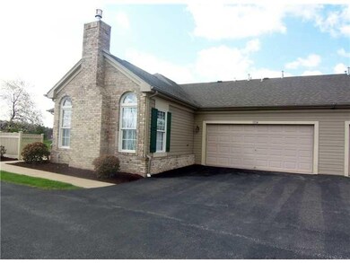 Parking Lot/Garage. Over sized 2 car garage & addi