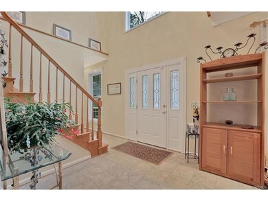 2 Story Front Foyer with Custom Tile