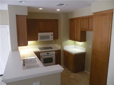 HOME FEATURES FULL UPGRADED KITCHEN WITH PLENTY OF CABINET AND COUNTER SPACE