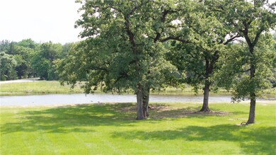 View of property with a water view.
