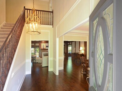 Another view of the foyer with new hardwood floors