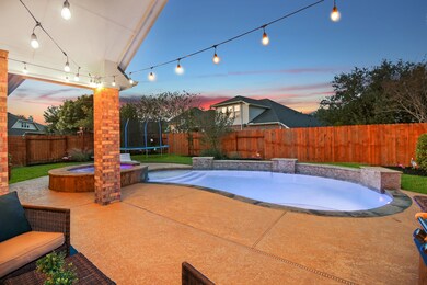 Outdoor Living to the finest! This generous covered Patio has special lighting.