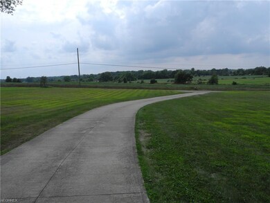 View from the front of the home.  Looking toward Schilling Ave, Nice cement driveway.