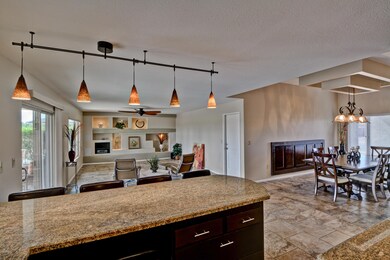 KITCHEN OPEN TO LIVING AND DINING AREA