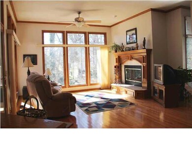 Awesome hearth room with two triple sets of window
