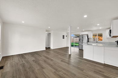 Unfurnished living room with recessed lighting and light wood-style floors