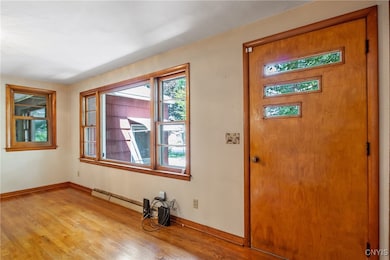 Front entry with picture window and lots of natura