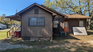 View of home's exterior featuring central air condition unit