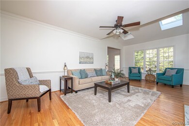 Walled with windows and grounded by a cozy fireplace, the Family Room creates the perfect spot for family fun and informal entertaining.