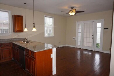 Front entrance, living room and kitchen. Open layo