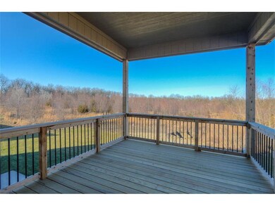 Covered deck located off the kitchen.  Great for e