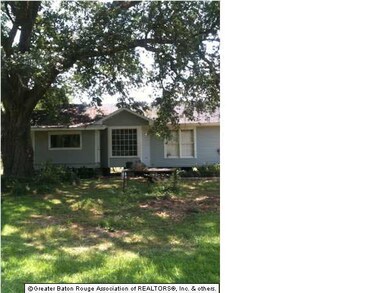This is a side view of the house with new paint co