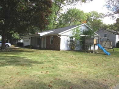 Side & front view of house