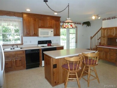 Eat in Kitchen with Island & Breakfast Bar. Enjoy meals and gatherings...large kitchen