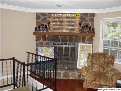 Beautiful rock Fireplace in Grtrm has gas logs (bu