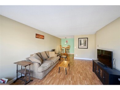Living room with view of dining space