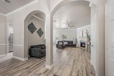 Living area featuring light wood-type flooring, v