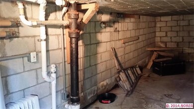 Washer and dryer in basement. Can fit small car in