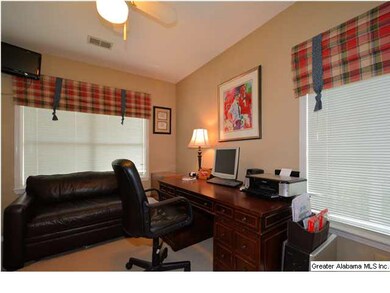 Bedroom off of living room with walk-in closet.