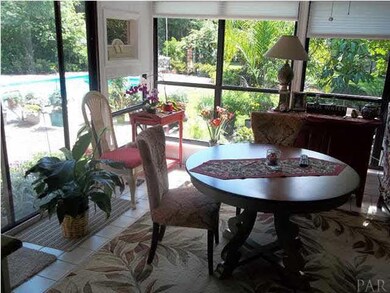 Walk through the Florida Room back into the living room