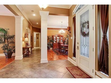 Foyer. Beautiful entry with custom molding and dia