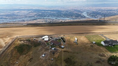 Aerial view of sparsely populated area with a mountain backdrop