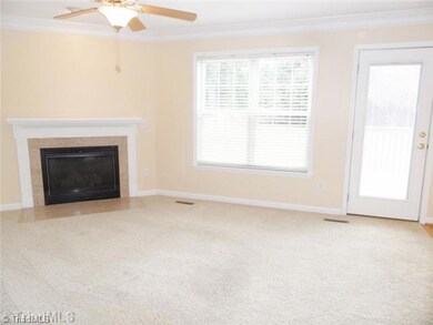 Den/Family/Great Room. The family room is oversized and flooded with natural light.  It features a gas fireplace, open to the kitchen/breakfast area and has access to the rear deck.