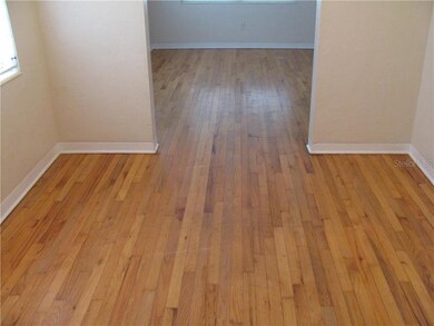 FORMAL DINING LOOKING TOWARD LIVING ROOM