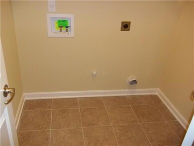 Separate laundry room.